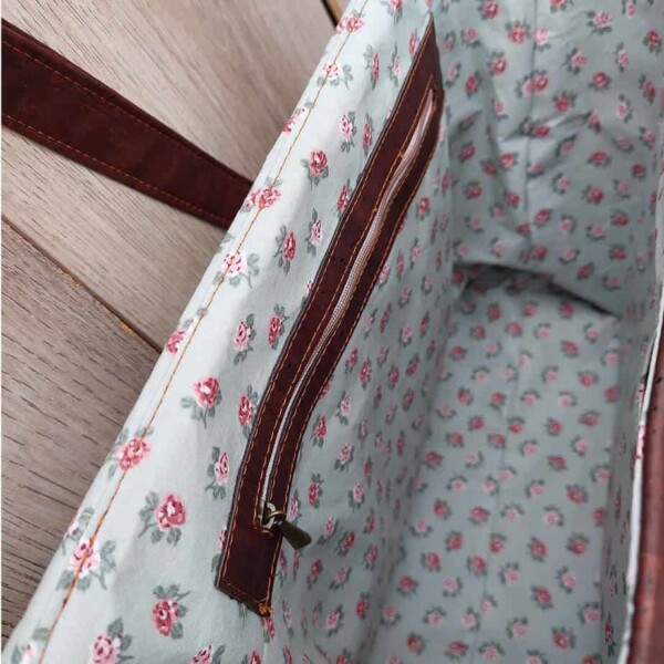 kurk schoudertas bruin binnenkant