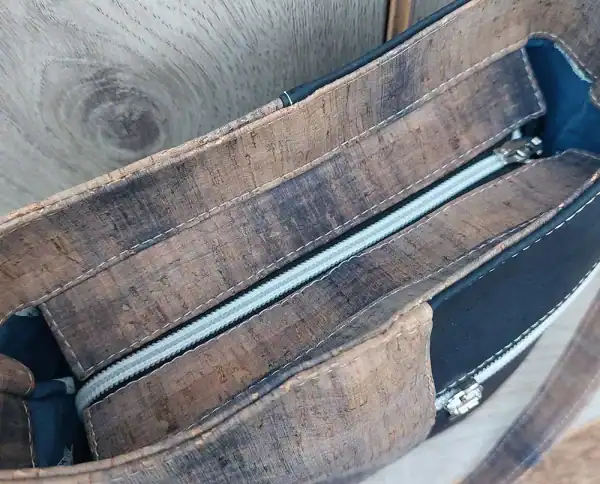 Detail van de bovenkant schoudertas Detail van de bovenkant schoudertas